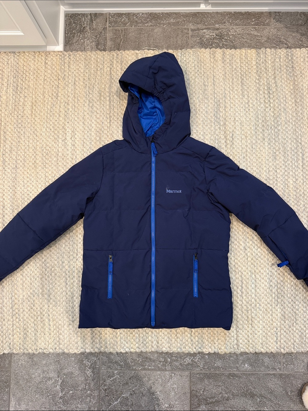 Marmot Navy Blue Hooded Puffer Jacket with Bright Blue Accents